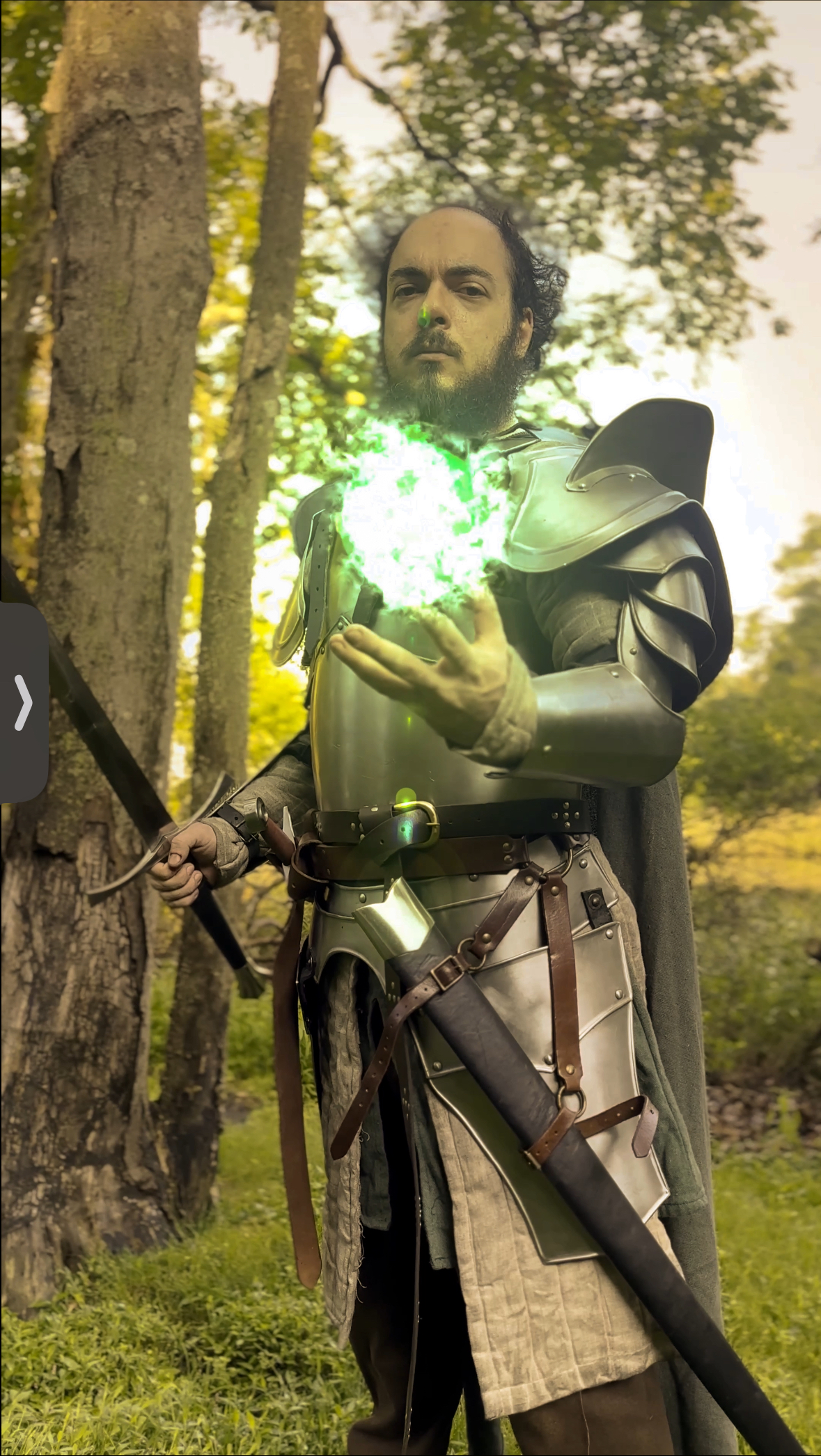 The paladin glares at the camera while holding a fireball